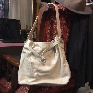 Cream leather Cole Haan purse. Brand new. No tags.